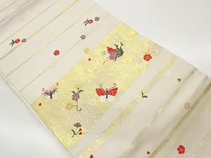 横段に蝶・花散らし模様織出し名古屋帯